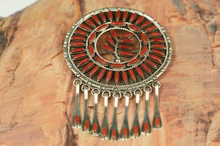 Genuine Blood Red Coral set in Sterling Silver Pendant. May also be worn as a brooch. Free 18" Sterling Silver Chain with Purchase of Pendant. Created by Zuni Artist F. Etsate. Signed.